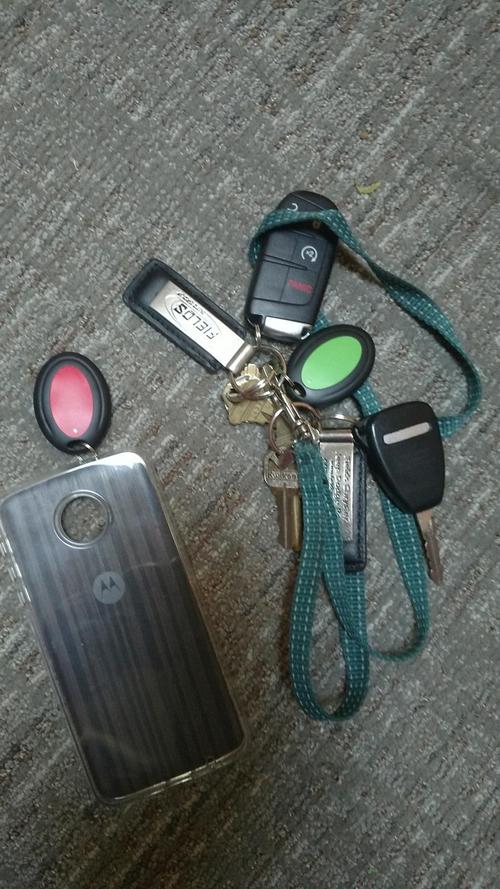 Anti-Lost Transmitter For Keys And Wallet With 4-In-1 Led Wireless Remote photo review